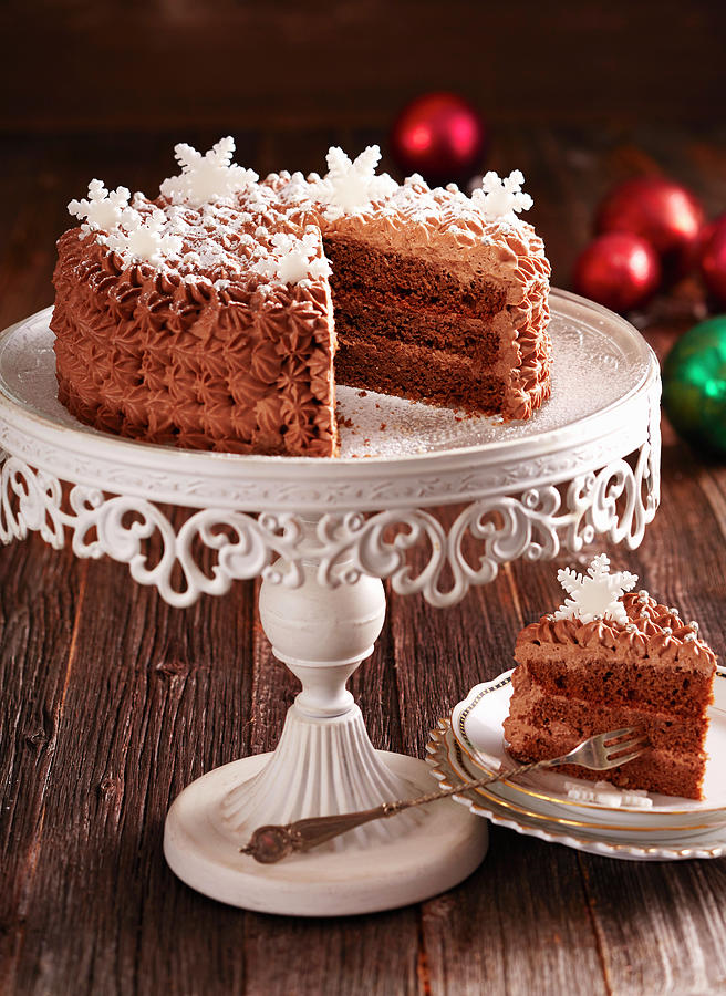 A Festive Rum-truffle Cake With Chocolate Cream And Fondant Snowflakes Photograph by Teubner Foodfoto