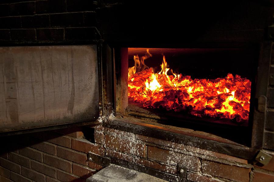 A Fire In A Wood-fired Oven Photograph by Studio Lipov