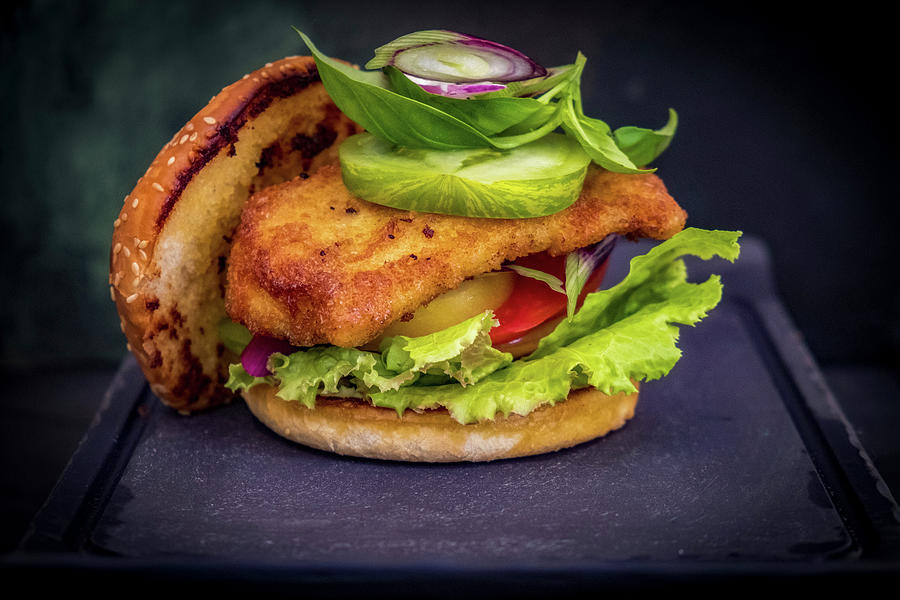 A Fish Burger With Green Tomatoes Photograph by Eising Studio