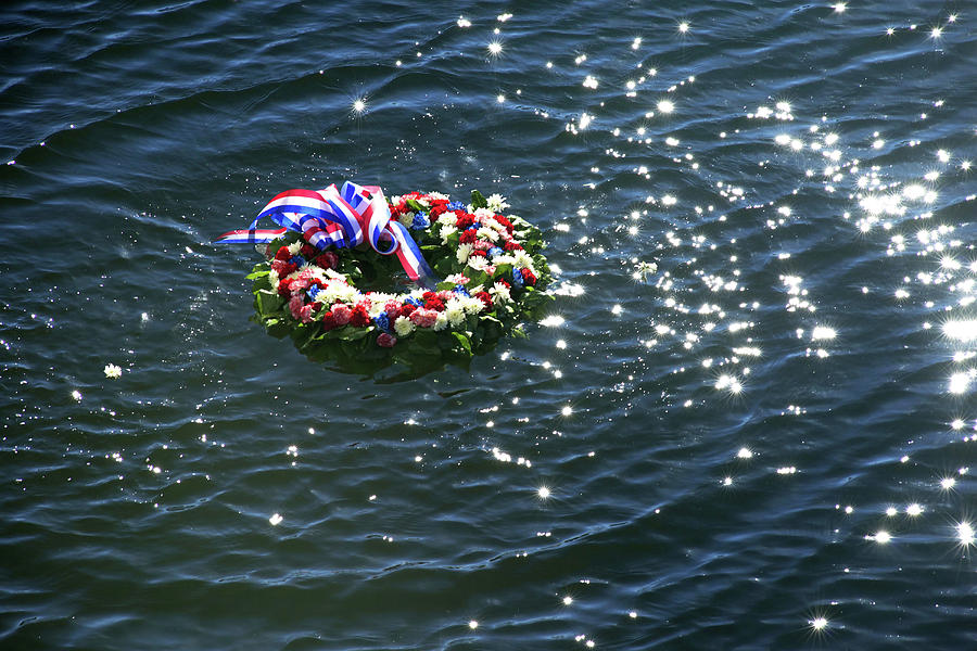 Baltimore Photograph - A Floral Wreath Is Placed In The Water by Stocktrek Images