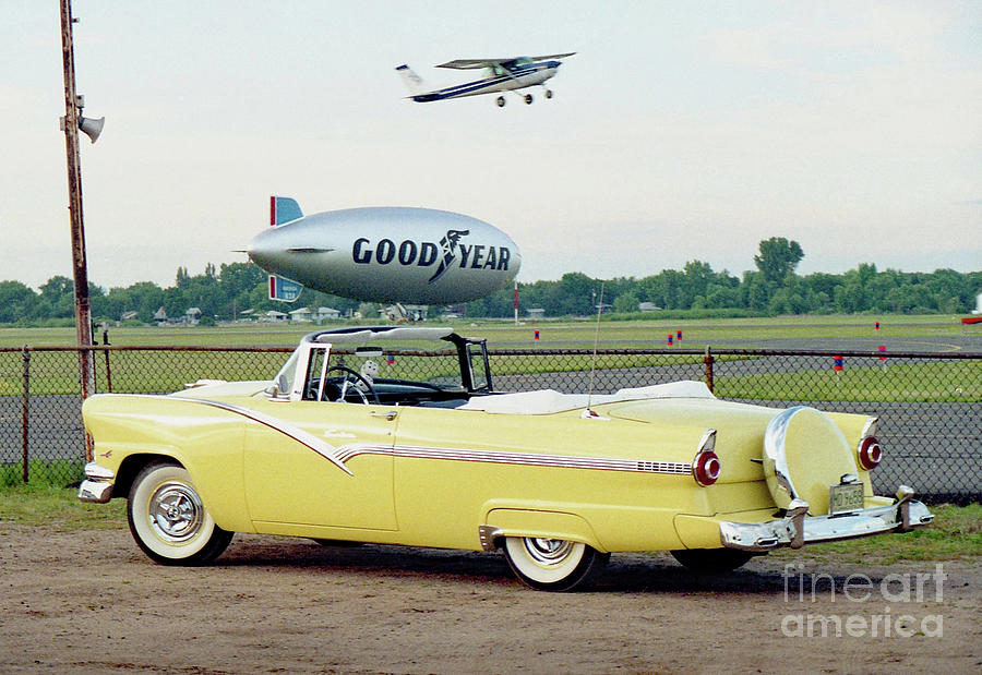 A Ford, a Blimp, and a Cessna Photograph by Ron Long