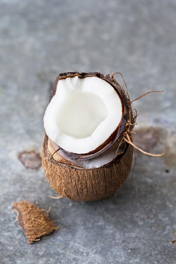 A Fresh Coconut, Cracked Open Photograph by Malgorzata Laniak