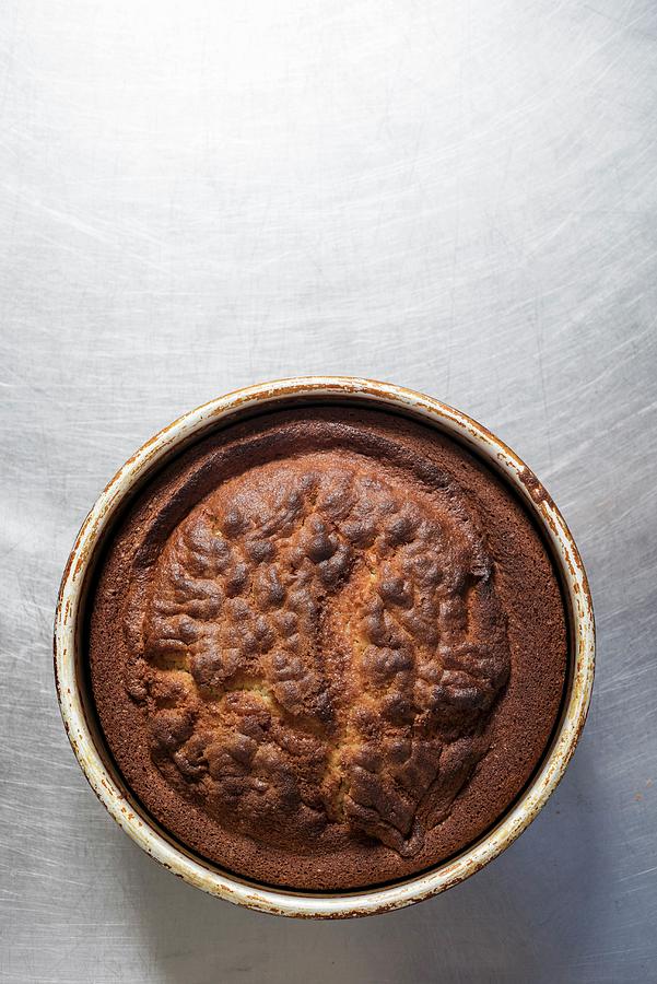 A Freshly Baked Cake In A Baking Tin Photograph by Lode Greven Photography