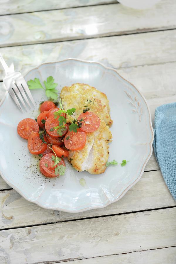 A Fried Redfish Fillet With Tomato Salad Photograph by Tanja Major