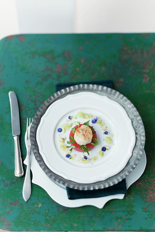 A Fried Scallop With Watermelon Jelly Photograph by Jalag / Wolfgang Schardt