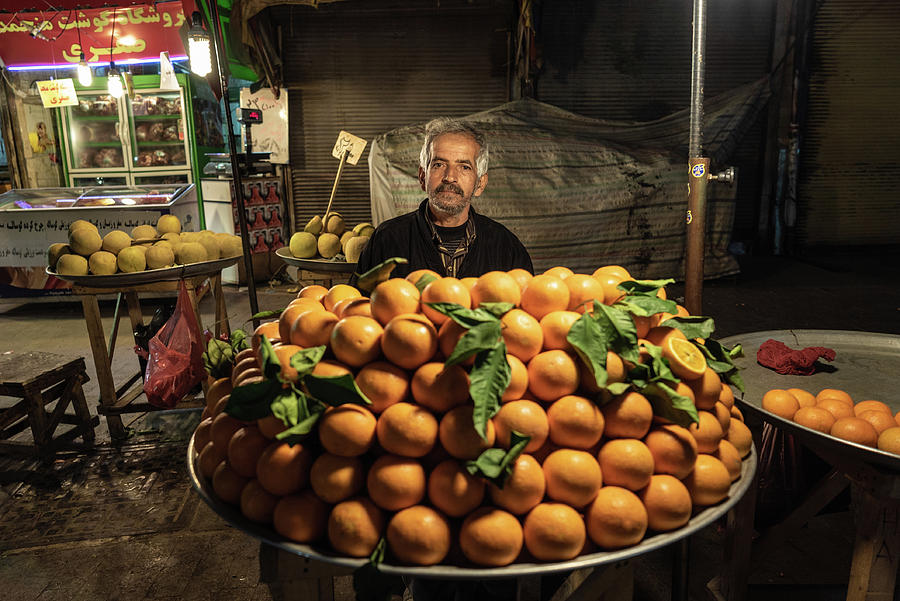 A fruit seller in Rasht Iran Photograph by Kamran Ali