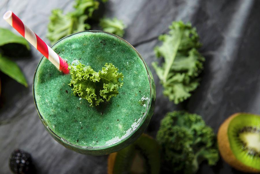 A Fruit Smoothie With Kale And Kiwi Photograph by Farrell Scott