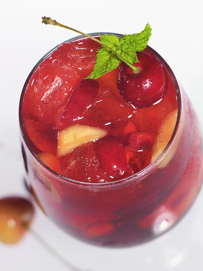 A Fruity Drink With Cherries Photograph by Brenda Spaude