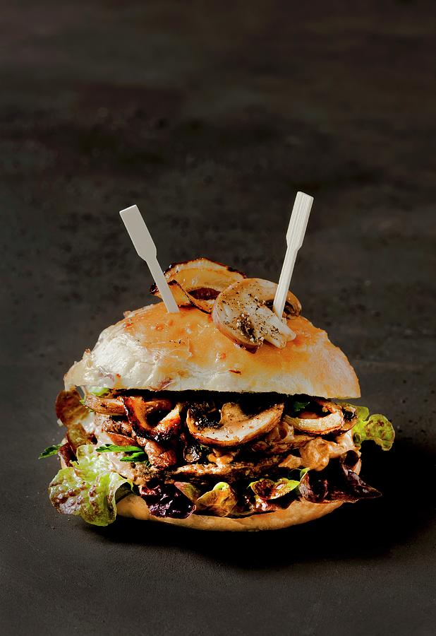 A Game And Mushroom Burger Photograph by Birgit Twellmann