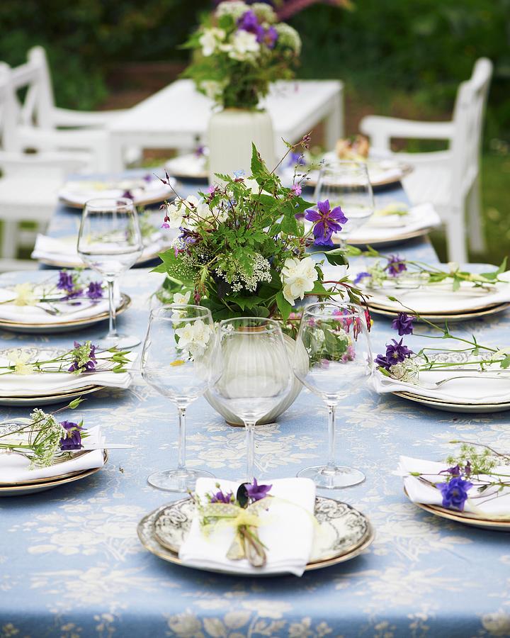 A Garden Table Laid With Meadow Flowers For A Mid-summer Festival Photograph by Hannah Kompanik