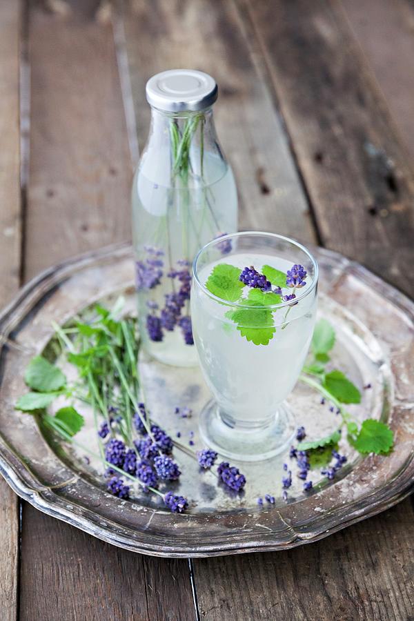 A Gin And Tonic With Lavender Flowers Photograph by Fanny Rådvik - Fine ...