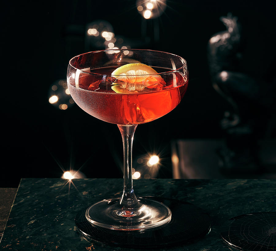 A Gin Dubonnet Against A Dark Background Photograph by Misha Vetter