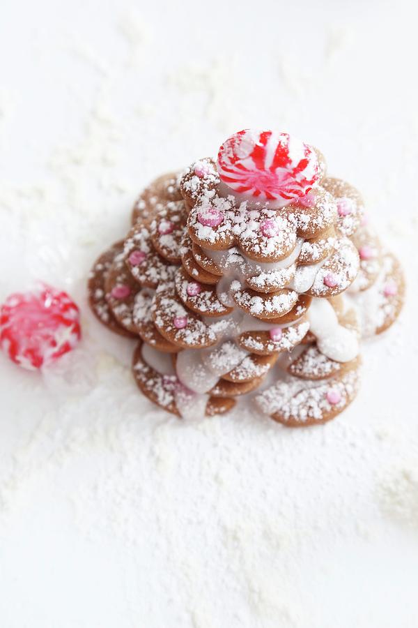 A Gingerbread Biscuit Christmas Tree Decorated With Icing Sugar And Peppermint Bonbons Photograph by Syl Loves