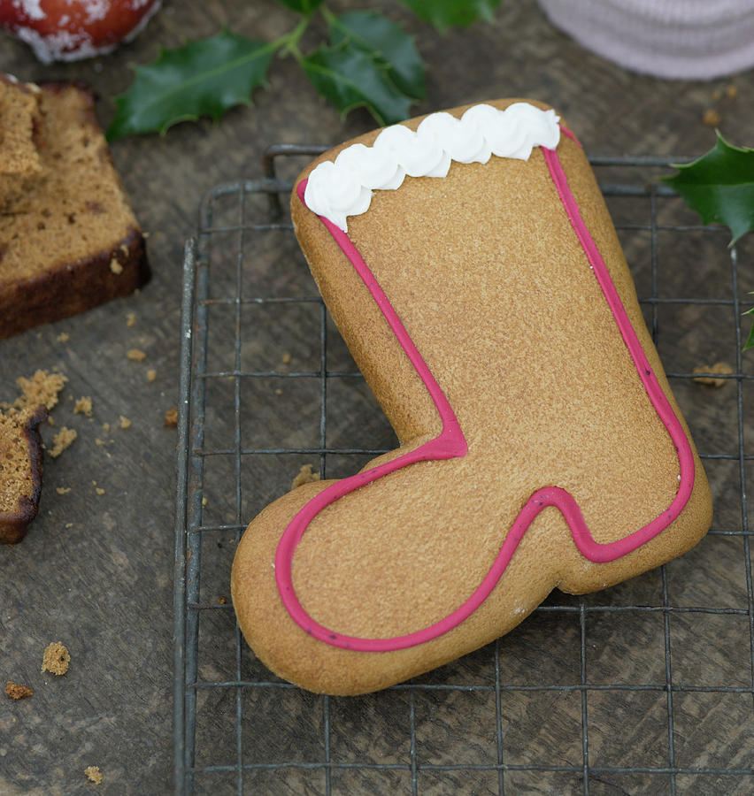 A Gingerbread Boot Biscuit Decorated With Meringue Photograph by Martina Schindler