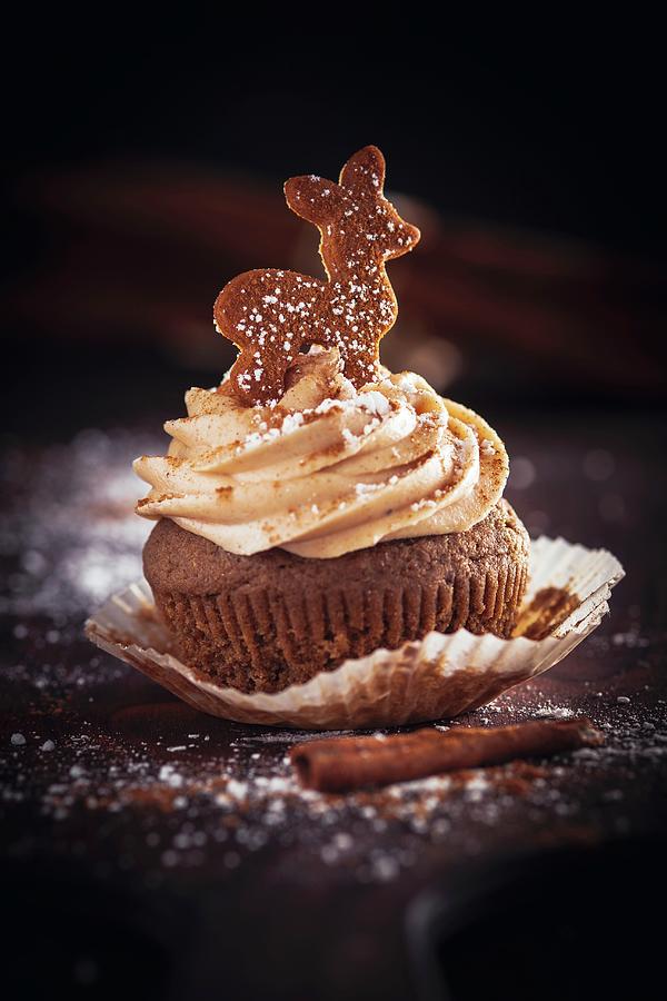 A Gingerbread Cupcake With Cinnamon & Cream Cheese Frosting Photograph by Eising Studio