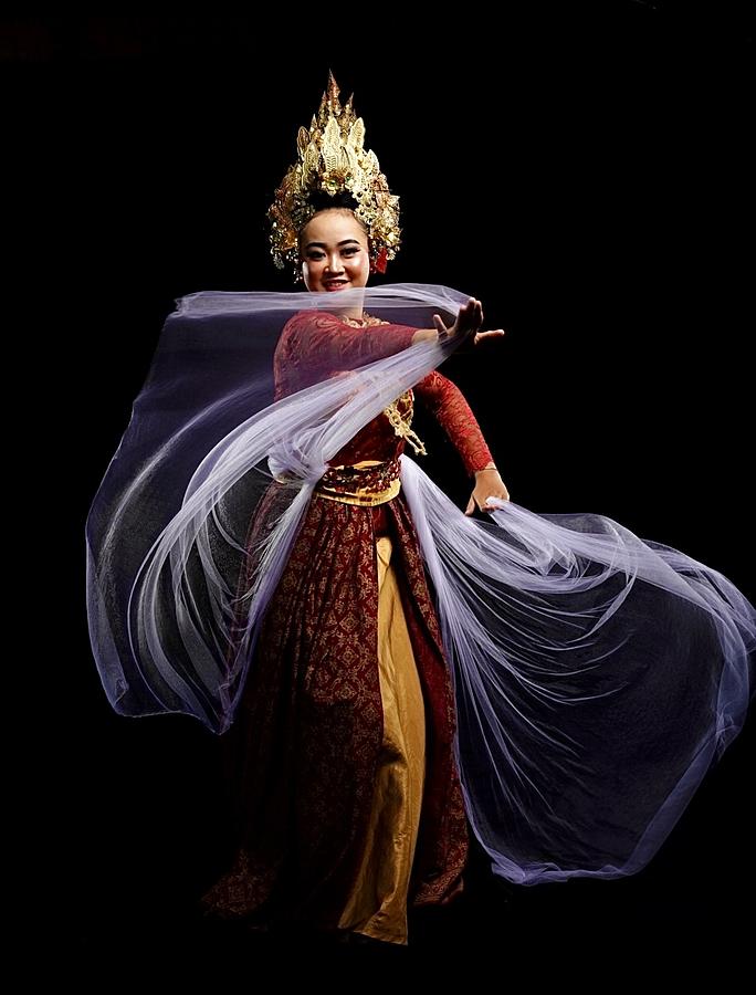 A Girl In Traditional Costume Rehearsing A Sundanese Dance Photograph by Rosmalawati Chalid