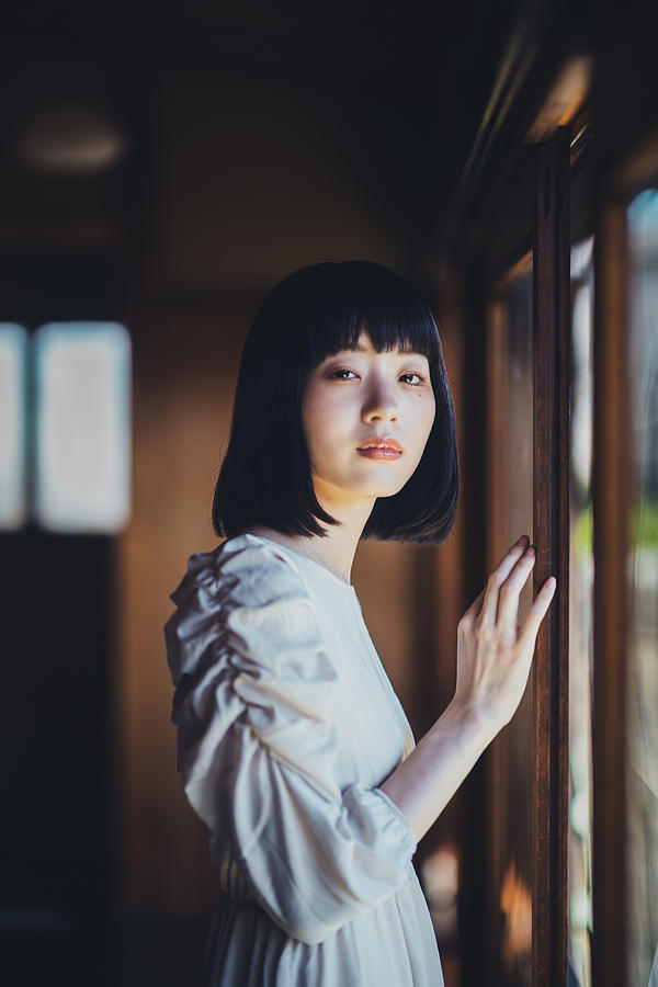A Girl On The Old Glass Window Photograph by Yuzo Fujii
