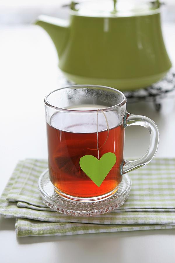 A Glass Cup Of Wellness Tea And A Teabag With A Heart Photograph by Hippel, Regina