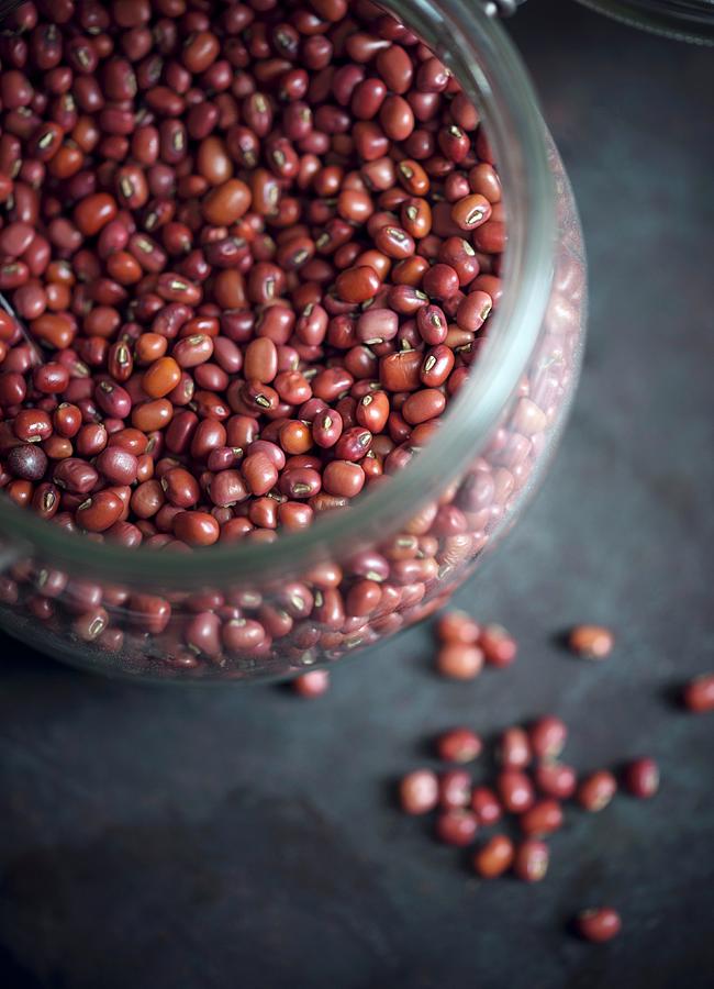 A Glass Jar Of Red Beans Photograph by Kati Neudert