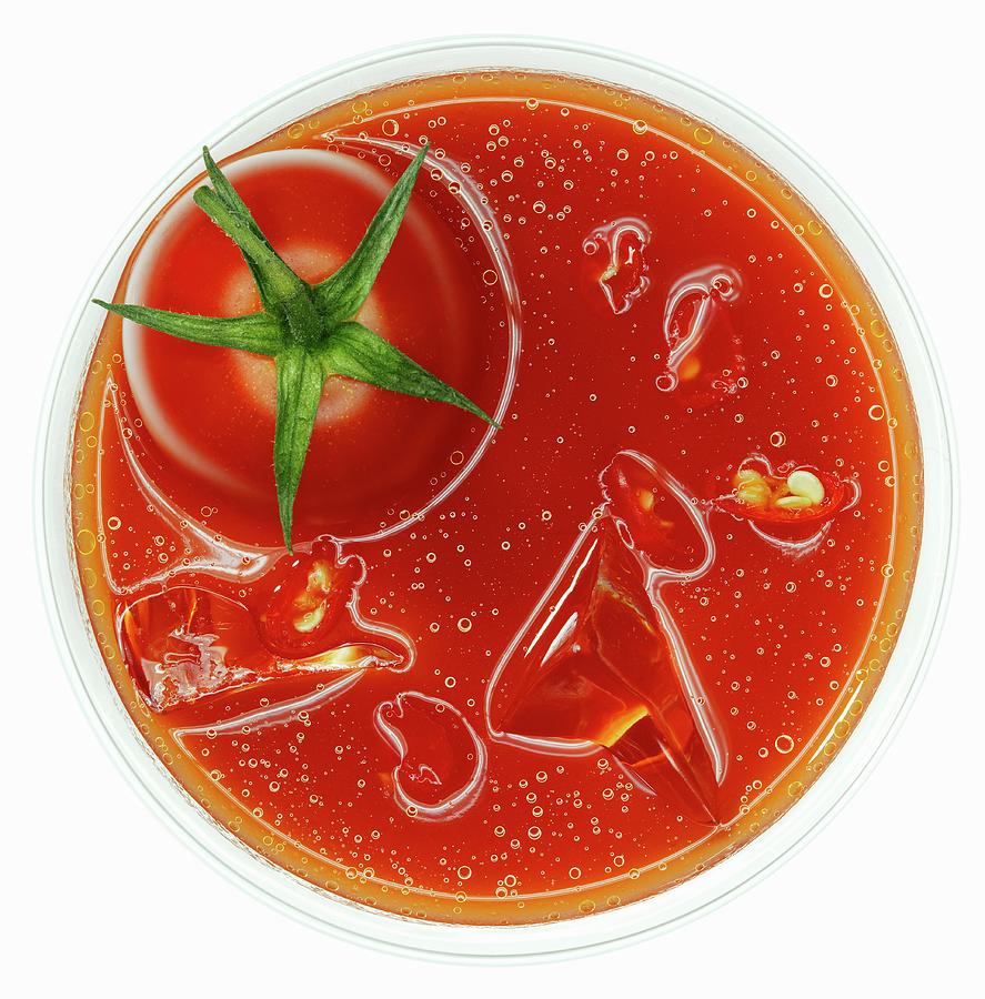 A Glass Of Bloody Mary With Ice And Tomato top View Photograph by Hermann Drre
