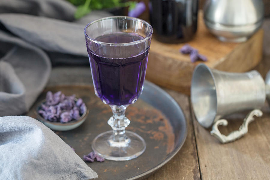A Glass Of Champagne With Violet Syrup From Toulouse Photograph by Nicole Godt