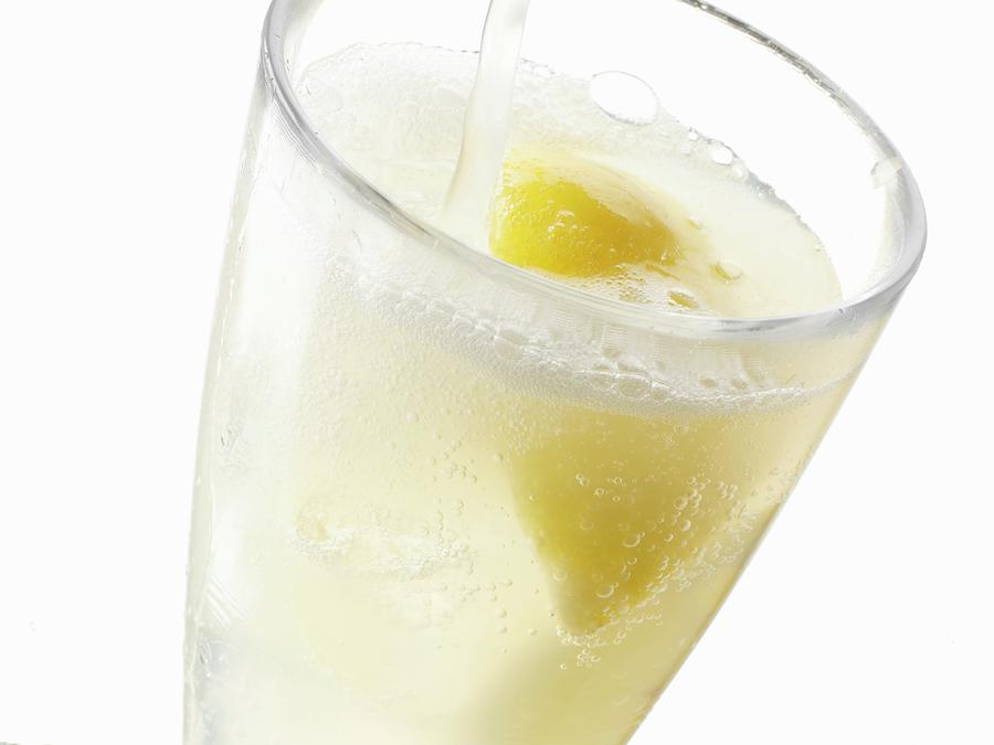 A Glass Of Fizzing Lemonade Photograph by Frank Adam