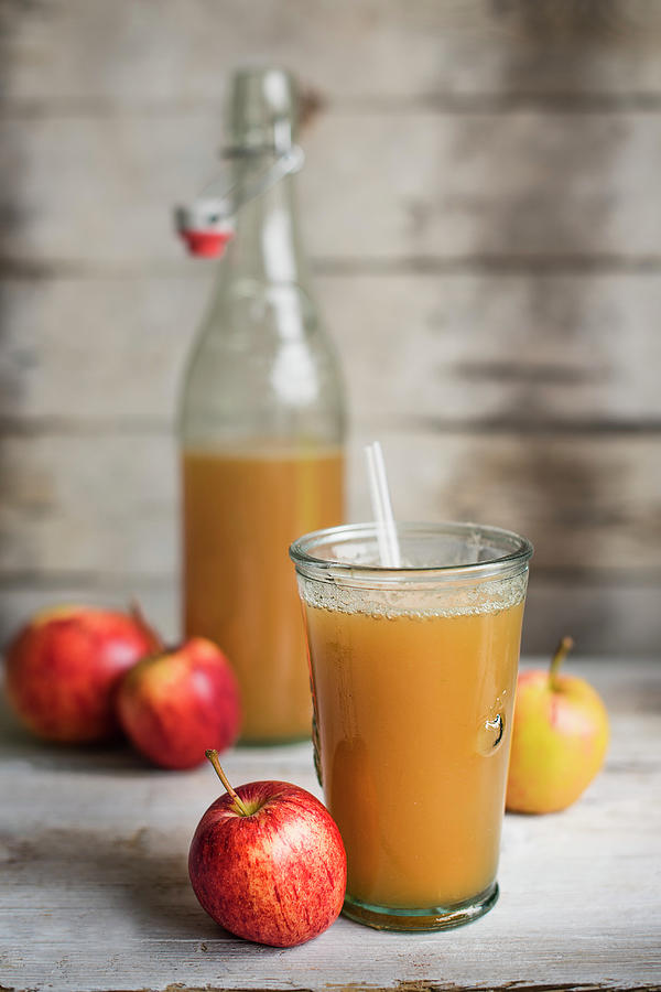 A Glass Of Freshly Pressed Apple Juice Photograph by Magdalena Hendey