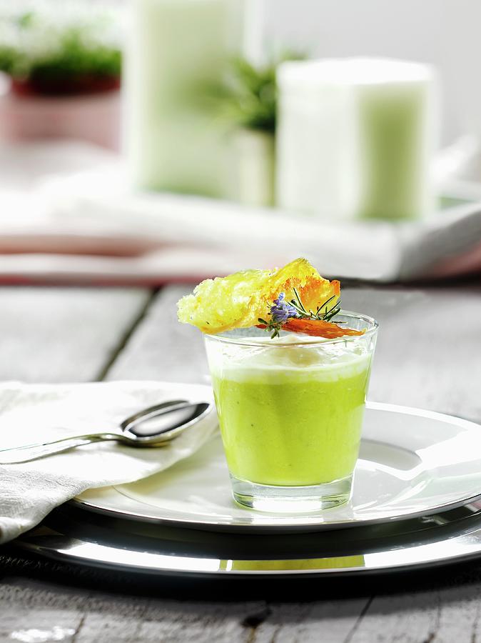 A Glass Of Green Asparagus Soup Photograph by Christian Schuster
