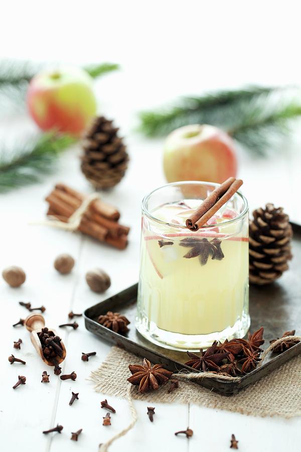 A Glass Of Hot Spiced Apple Juice Photograph by Jane Saunders