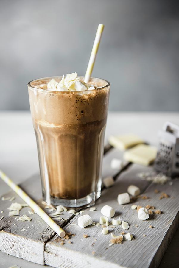 A Glass Of Iced Coffee With White Chocolate And Marshmallows Photograph by Magdalena Hendey