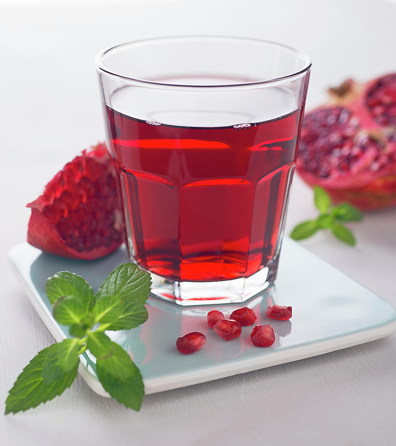 A Glass Of Pomegranate Juice Photograph by Jrg Strehlau