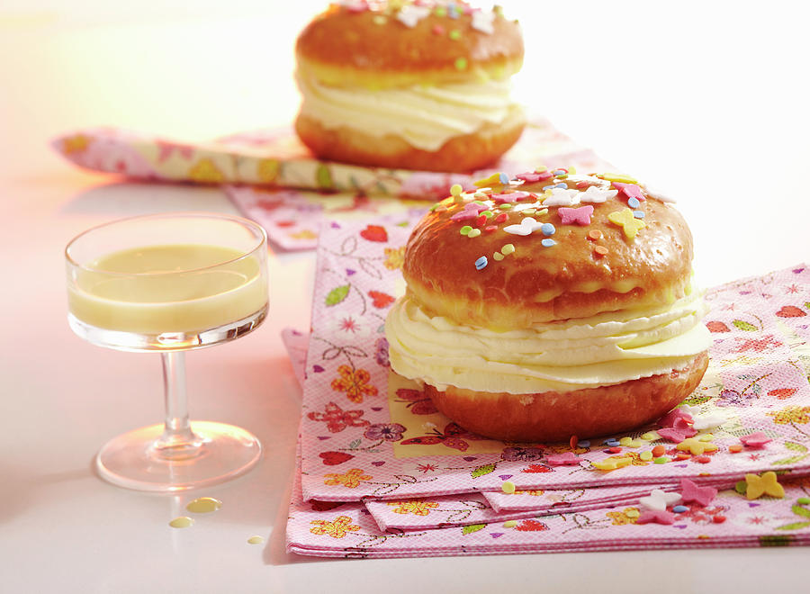 A Glazed Carnival Doughnut Filled With Eggnog Cream Photograph by Teubner Foodfoto