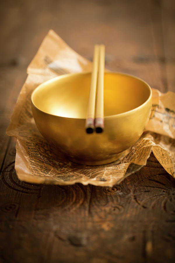 A Golden Bowl With Chopsticks Photograph by Eising Studio