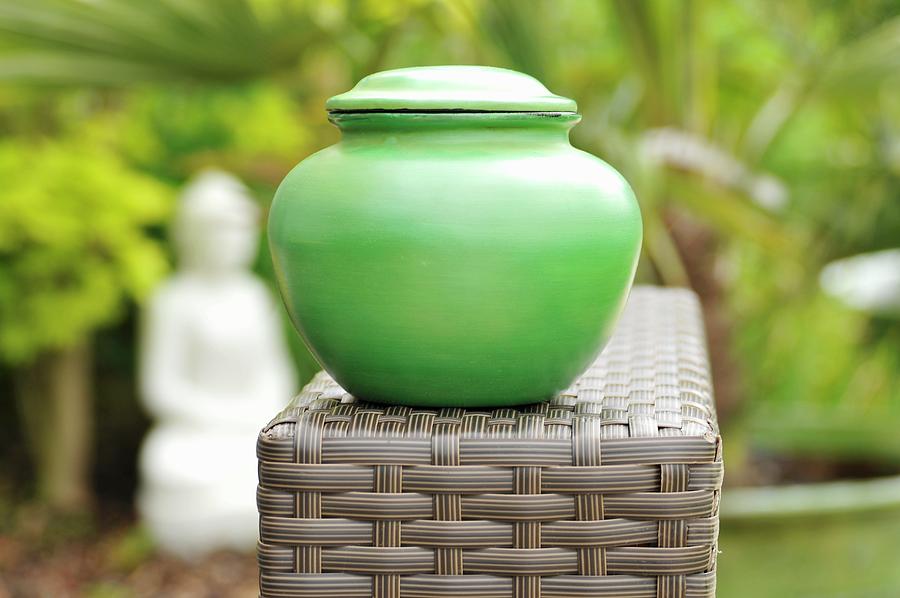 A Green Jar With Lid In An Oriental Garden, Burma Photograph by Mohrimages
