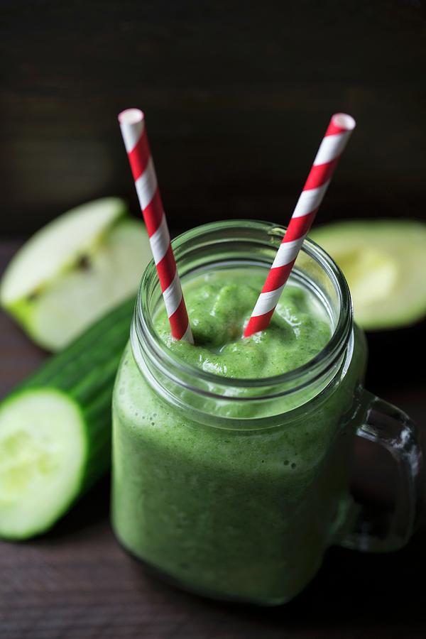 A Green Smoothie Made From Cucumber, Apple And Avocado Photograph by Nicole Godt