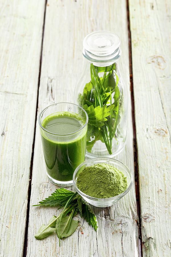 A Green Smoothie Made From Stinging Nettles, Wheatgrass And Dandelion Photograph by Petr Gross