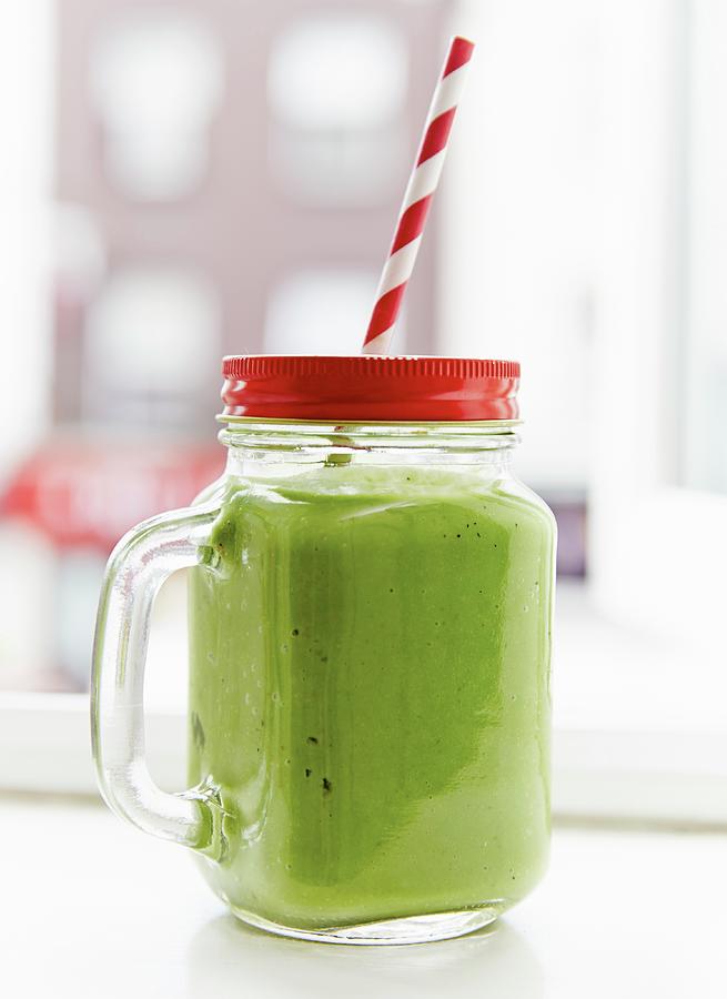 A Green Smoothie Made With Avocado And Spinach Photograph by Hannah Elizabeth
