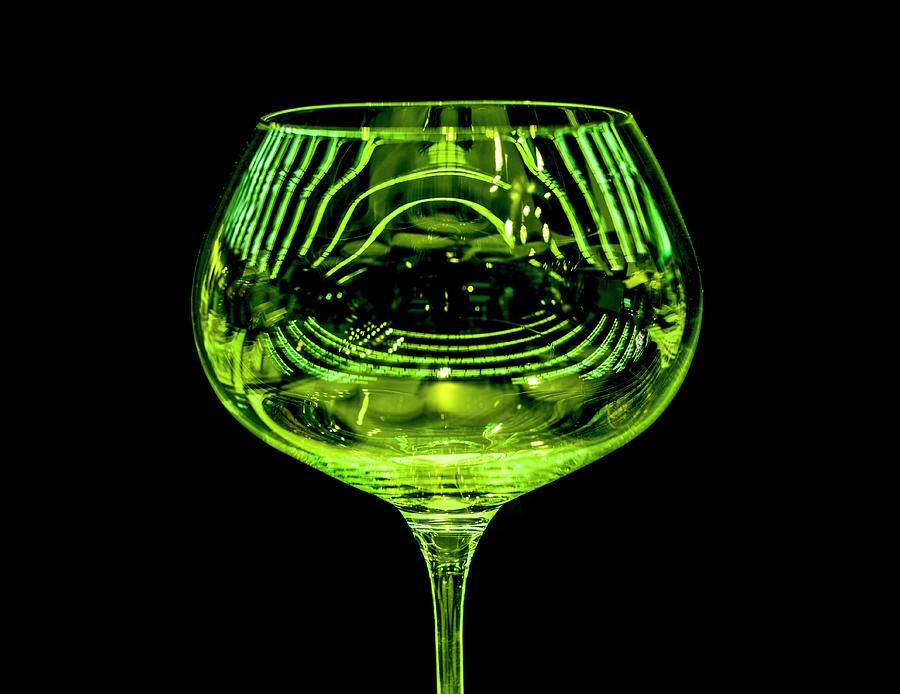 A Green Wine Glass Reflecting The Light Photograph by Michael Van Emde Boas