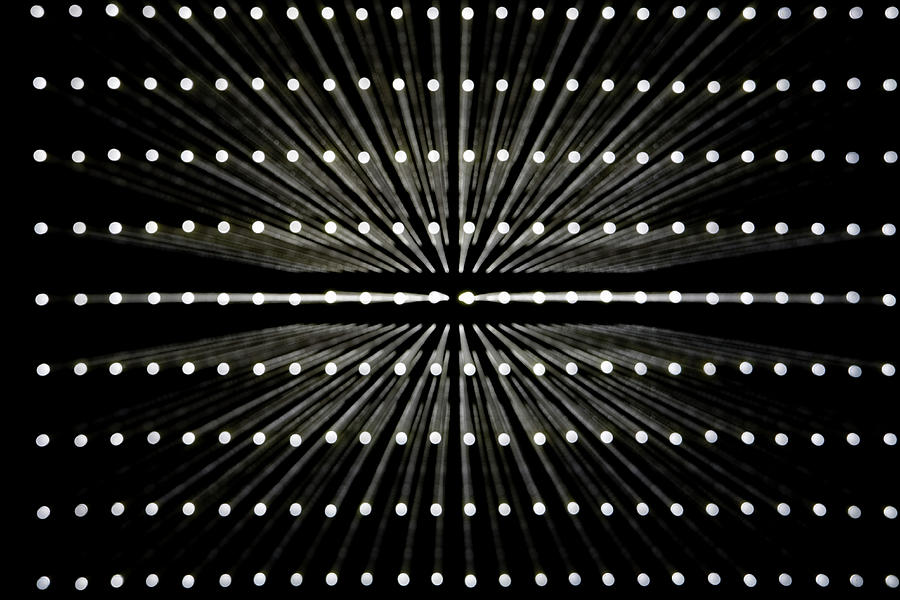 A Grid Of White Lights Illuminated Photograph by Caspar Benson