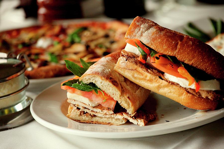 A Grilled Panini With Chicken, Tomato And Mozzarella Photograph by Bob Kahn