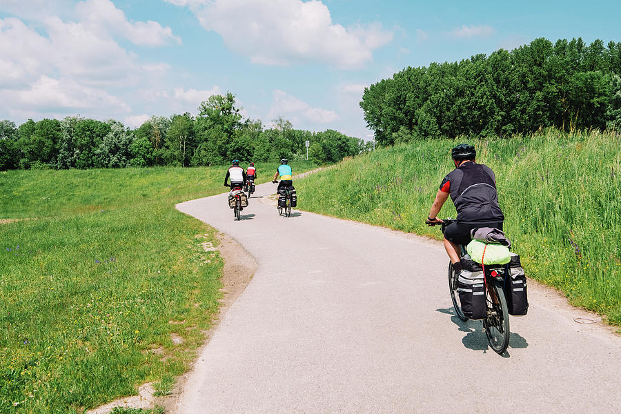 A Group Of Cyclists In The Rin Route, Germany Photograph by Cavan ...