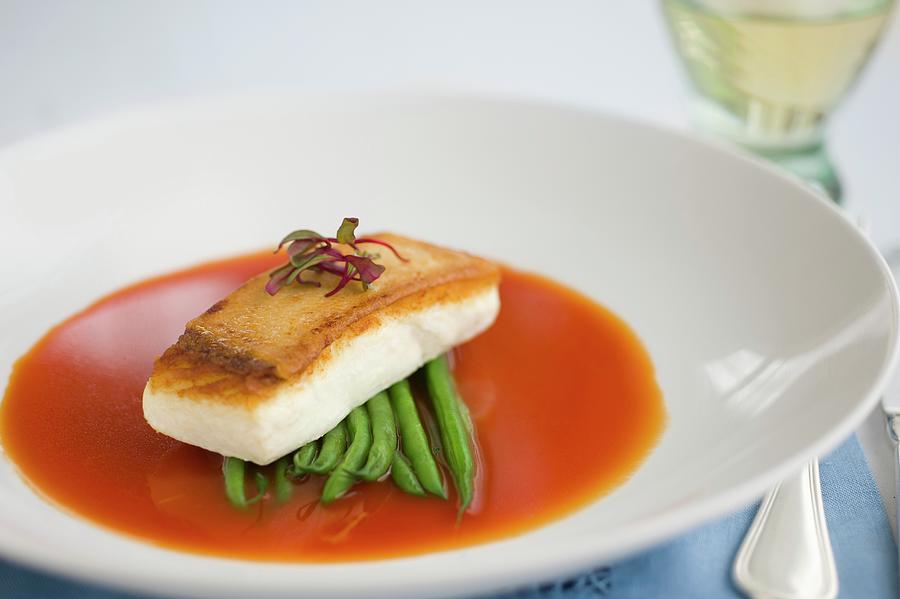 A Halibut Fillet With Green Beans In Tomato Consomm Photograph by Jim Scherer