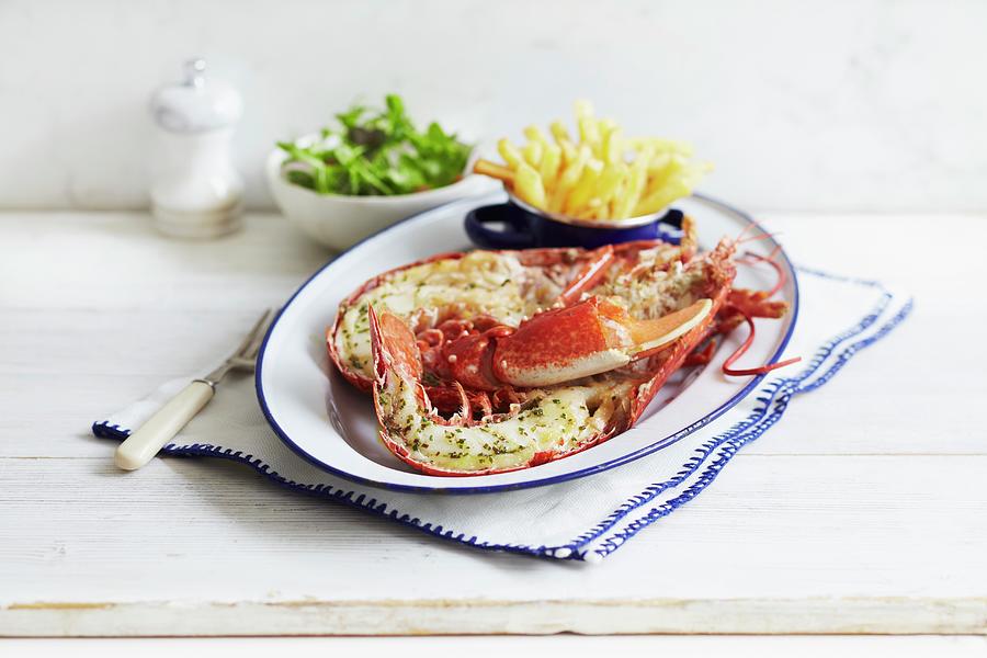 A Halved Lobster With Chips And A Side Salad Photograph by Charlotte Tolhurst