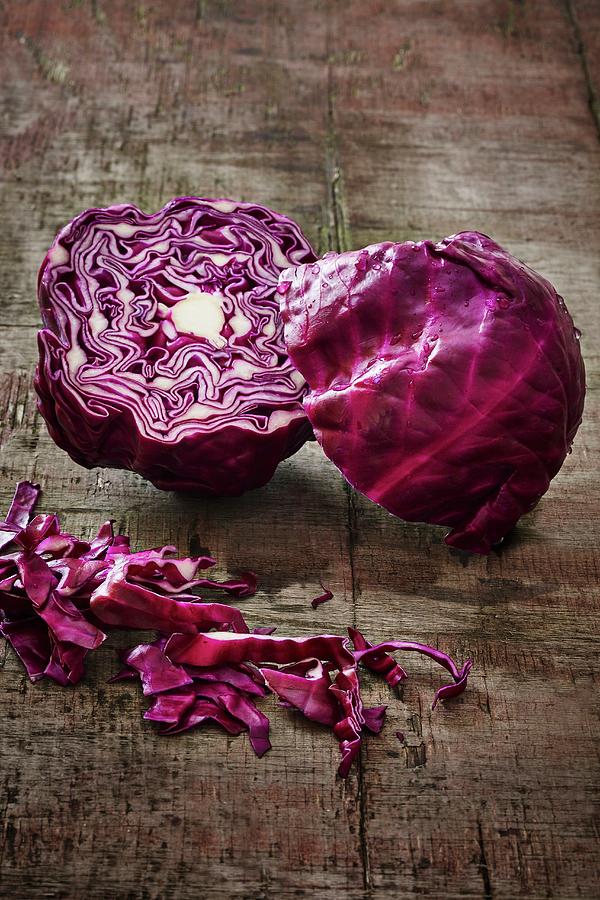 A Halved Red Cabbage On A Wooden Board Photograph by Tim Atkins Photography