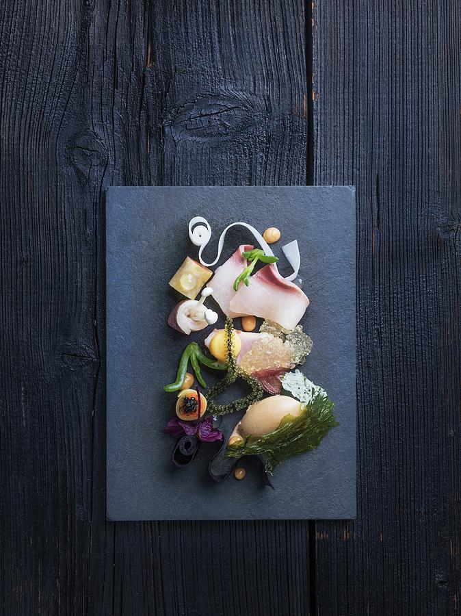 A Hamachi Platter With Seaweed And A Side Of Vegetables Photograph by Armin Zogbaum