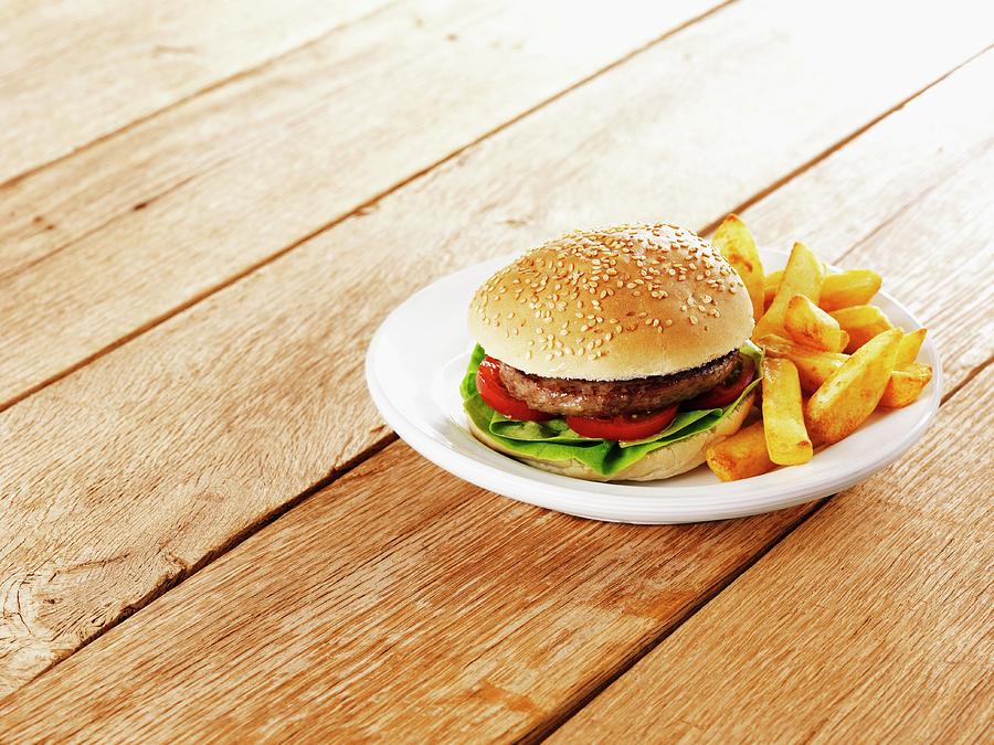 Potato Photograph - A Hamburger With Chips On A Plate by Frank Adam