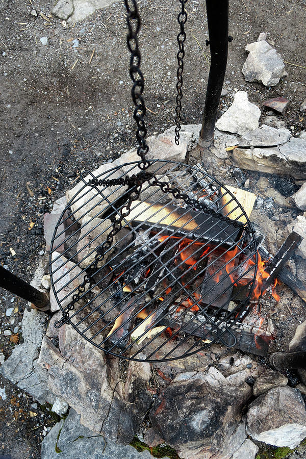 A Hanging Barbecue Grate Over A Fire Photograph by Petr Gross