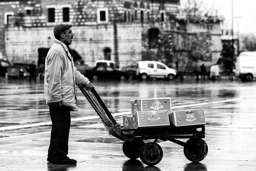 A Hard Day in Istanbul Photograph by John Rizzuto