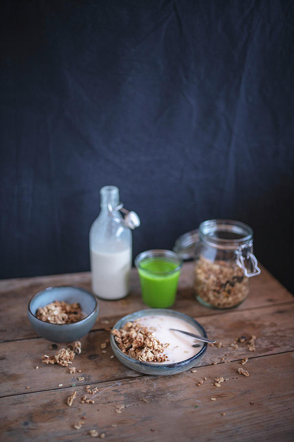 A Healthy Breakfast With Muesli And A Smoothie On A Rustic Wooden Table Photograph by Anna-lena Rpfl