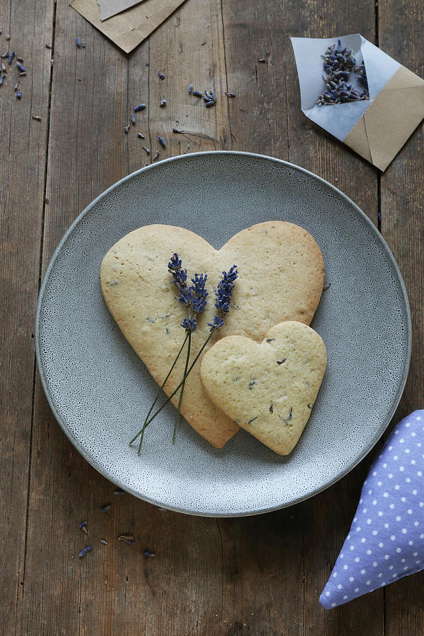 A Heart-shaped, Gluten-free Lavender Shortbread Biscuit On A Plate Photograph by Regina Hippel